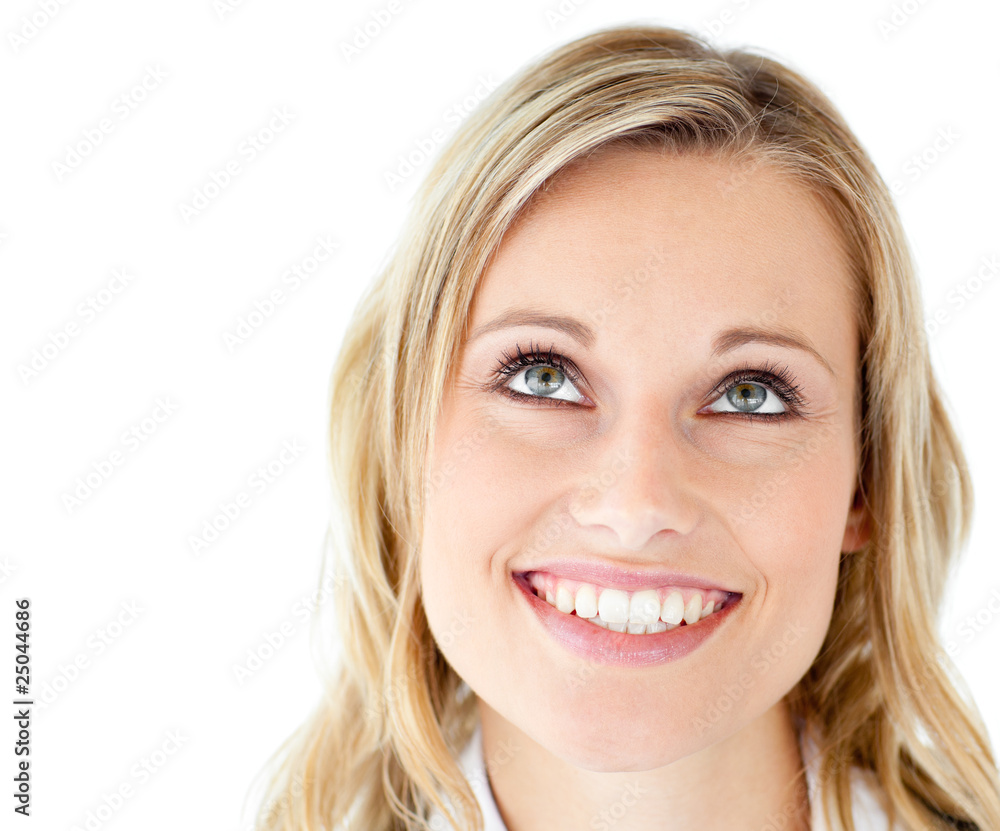 Portrait of a smiling businesswoman looking upwards Portrait of a smiling businesswoman looking upwards