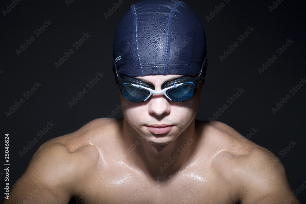 Portrait of Man Wearing Swimming Cap and Goggles Portrait of Man Wearing Swimming Cap and Goggles