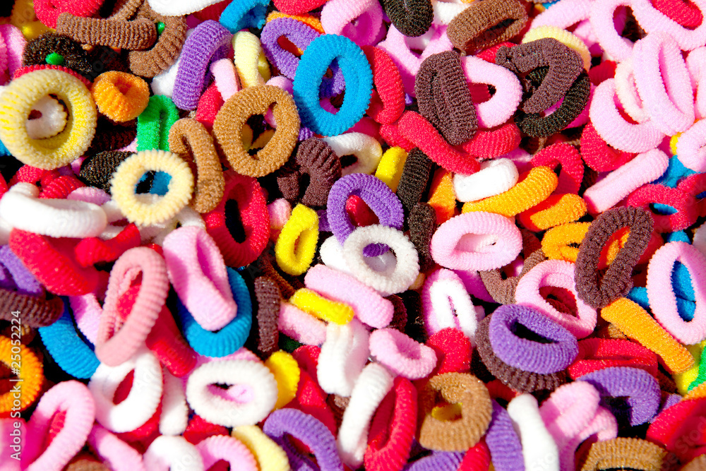 background of colorful hair elastics