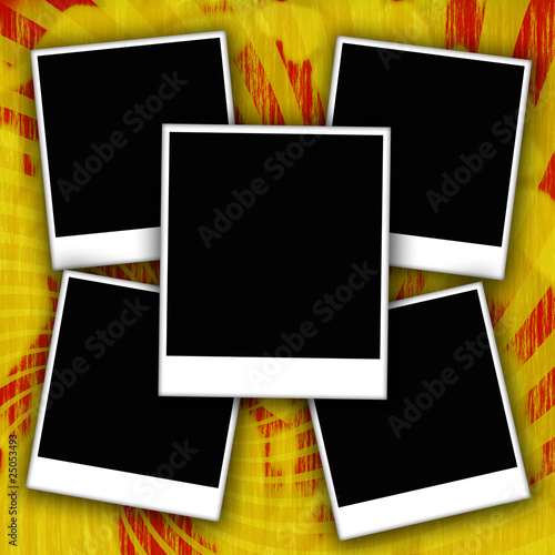 Blank photo frames on old textured background