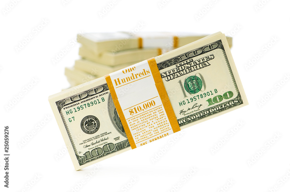 Stack of dollars isolated on the white Stack of dollars isolated on the white