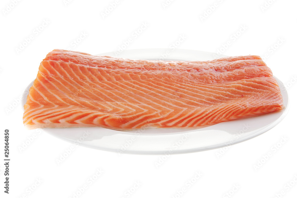 big salmon fillet on white plate big salmon fillet on white plate