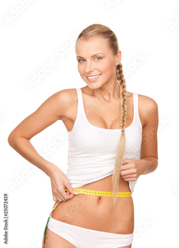 beautiful woman with measure tape