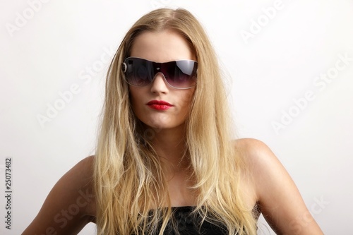 Wallpaper Mural young female beauty with sunglasses Torontodigital.ca