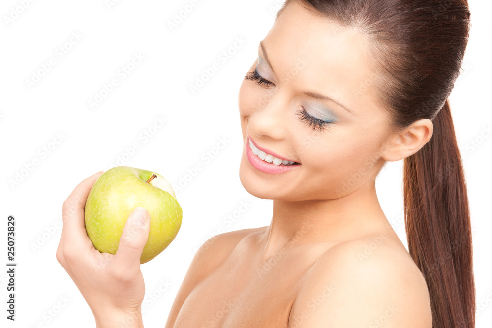 young beautiful woman with green apple young beautiful woman with green apple