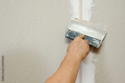 Obraz na płótnie man putty plasterboard