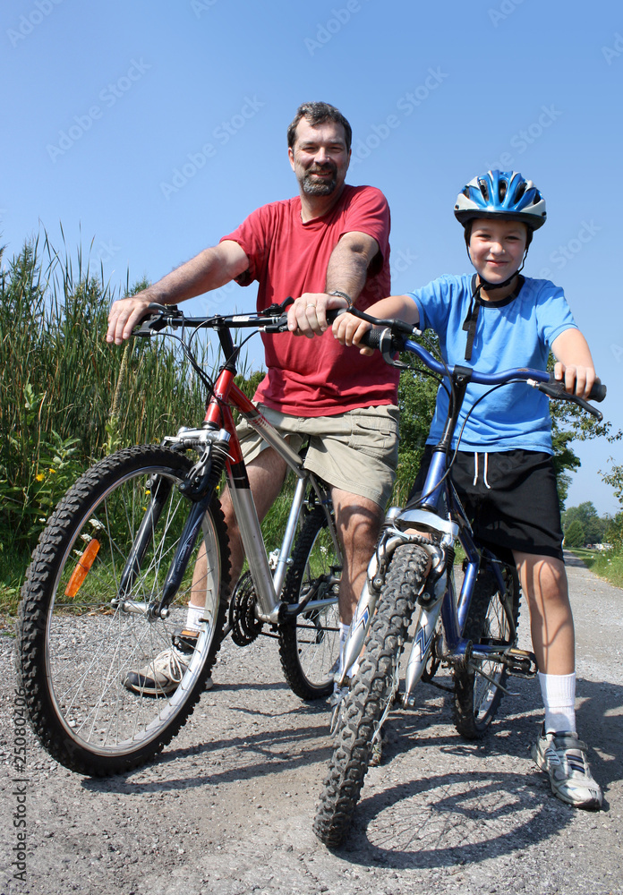 Fototapeta premium father and son biking