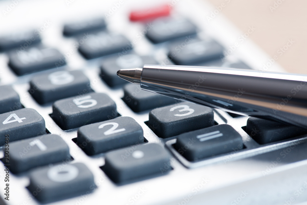calculator and pen