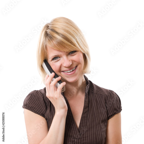 young smiling woman talking at phone isolated on white