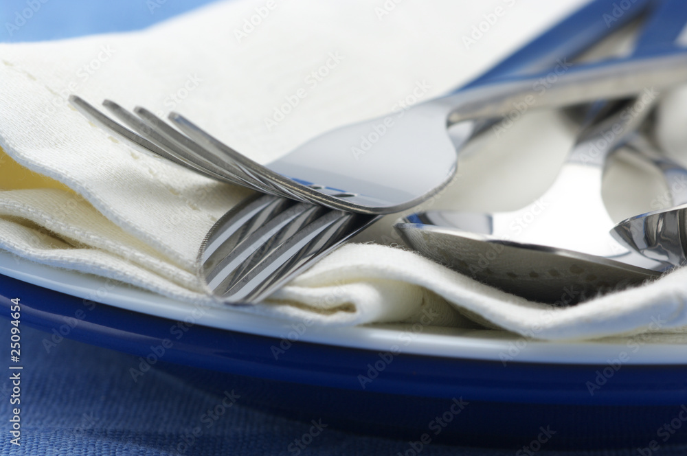 Silverware on plates