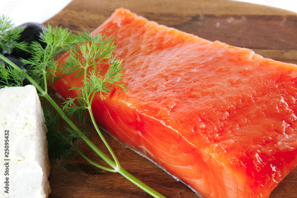 fresh smoked salmon on white plate with white cheese fresh smoked salmon on white plate with white cheese