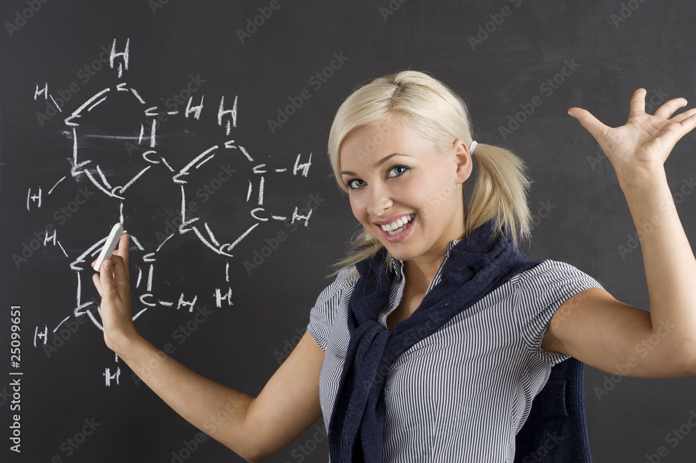 student girl at blackboard