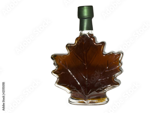Maple syrup in glass bottle