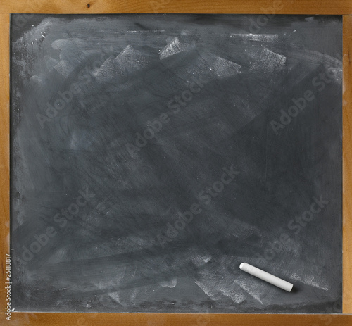 blank blackboard and chalk straight on