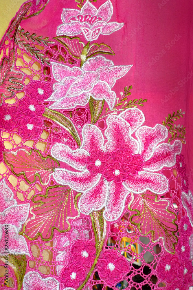 Dark pink Kebaya cloth with white flowers