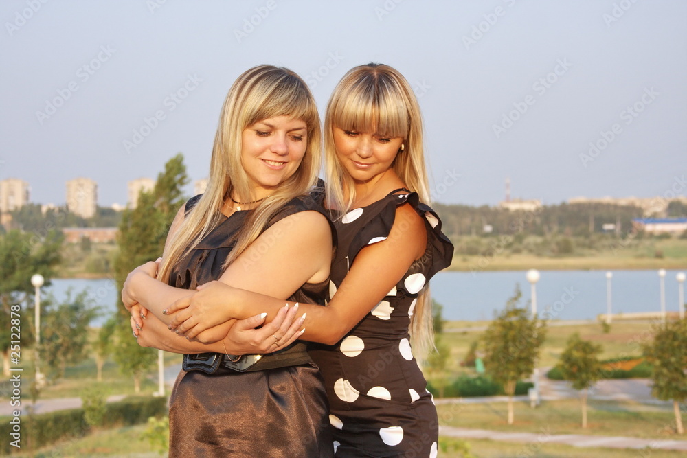 Fototapeta premium Two beautiful girls on nature