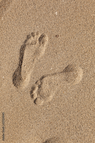 footprints  of man at the beach