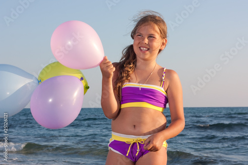 Girl with balloons.
