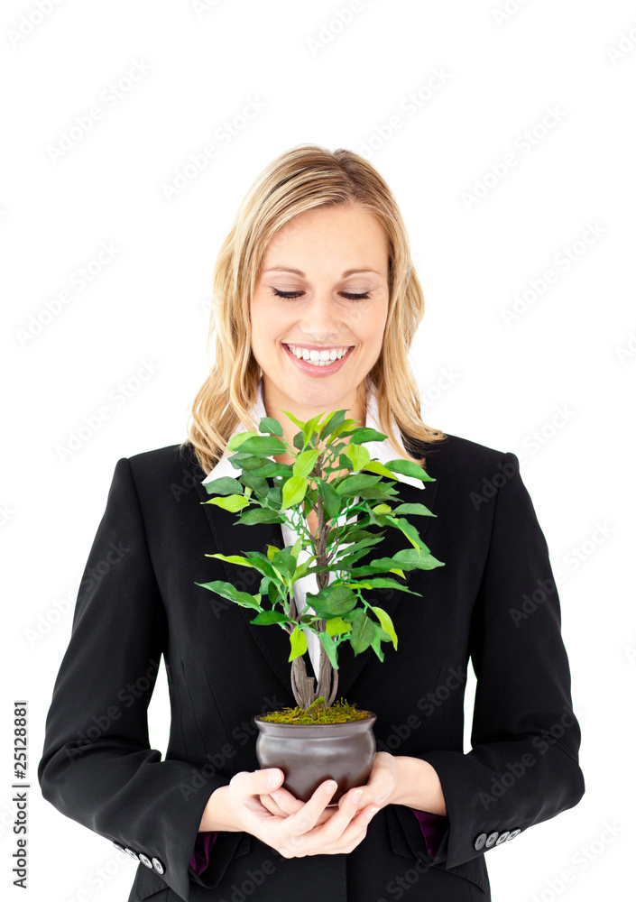 Portrait of a charismatic businesswoman holding a plant Portrait of a charismatic businesswoman holding a plant