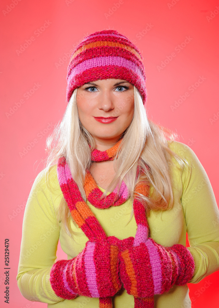 Seasonal portrait of pretty funny woman in hat and gloves smilin Seasonal portrait of pretty funny woman in hat and gloves smilin