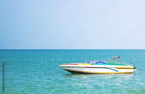 Colored vintage motorboat © Nozyer