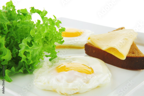 green lettuce and fried eggs