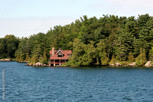 Large cabin on a lake © ivan_sabo