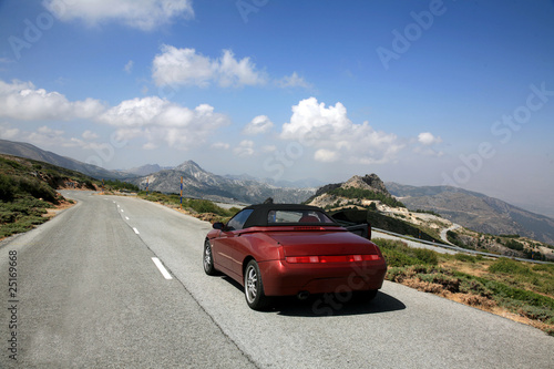 Sport car cabriolet across Sierra Nevada in Spain © Elena Kovaleva