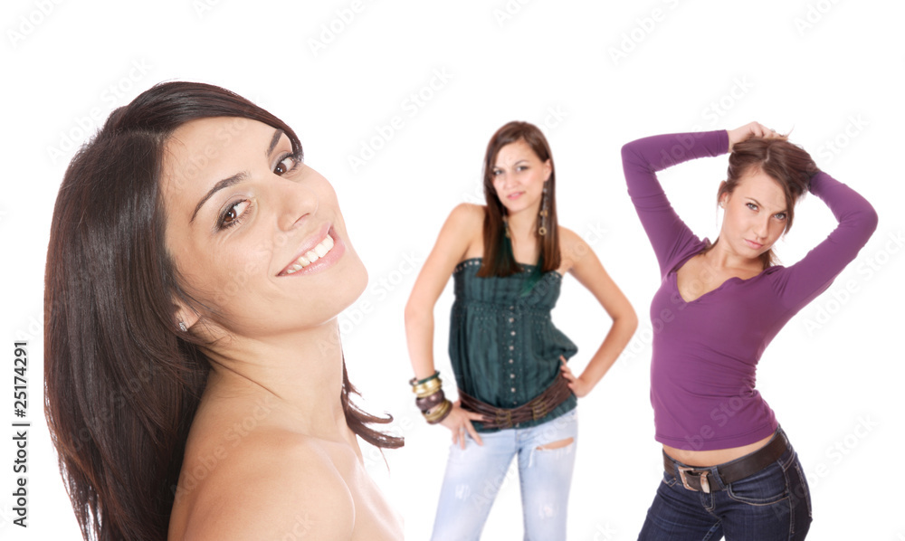 Three women standing around talking. Three women standing around talking.