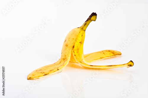 old slippery banana peel lying on a floor as a trap