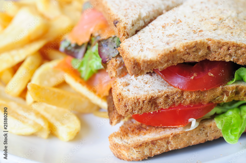 Fresh Salmon Sandwich and French fries Fresh Salmon Sandwich and French fries