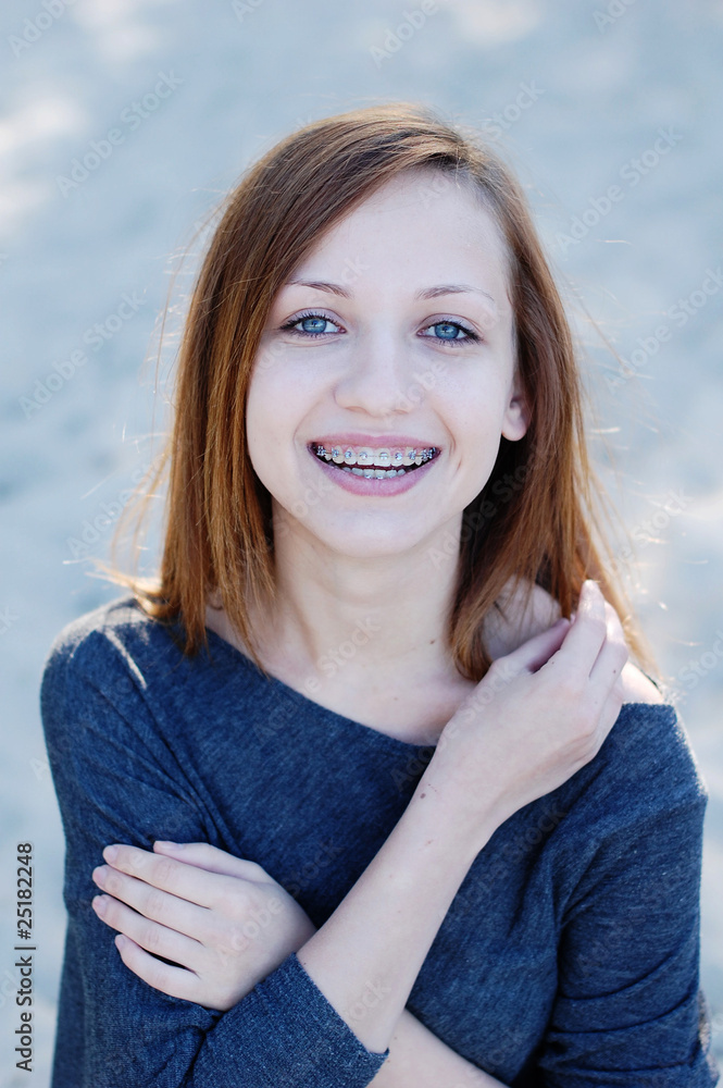 Girl with braces smiling cheerfully Girl with braces smiling cheerfully