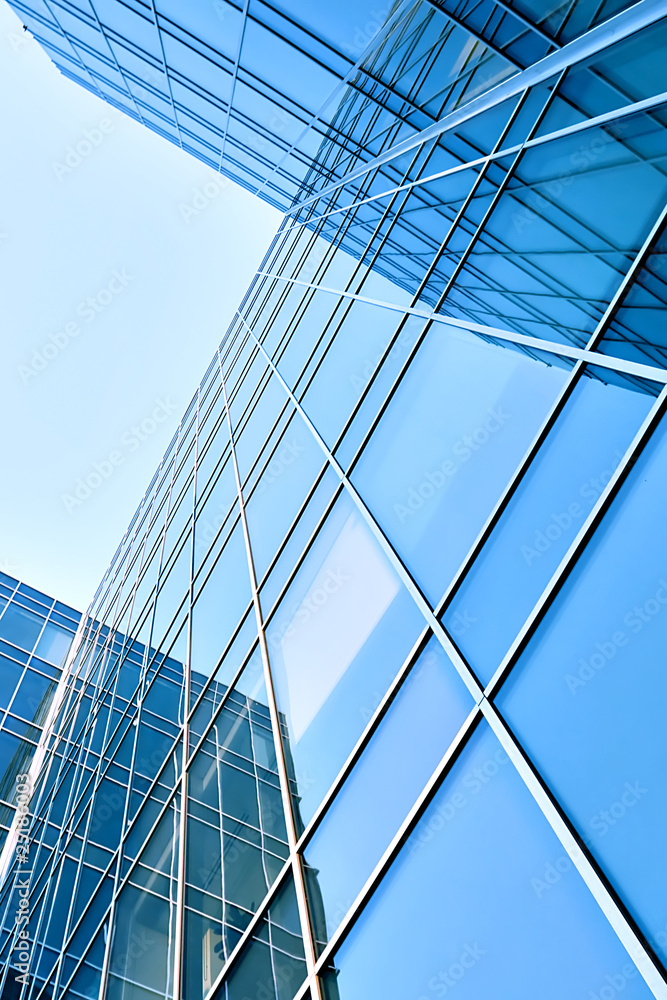 Obraz premium modern glass skyscraper perspective view
