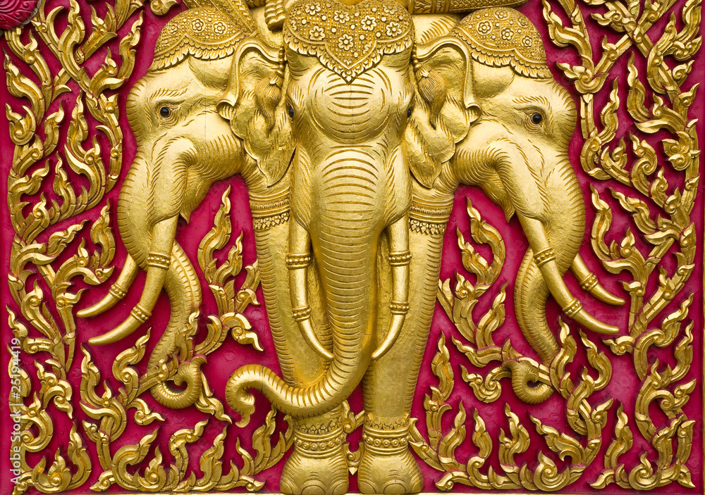 Fototapeta premium elephant carved gold paint on church door