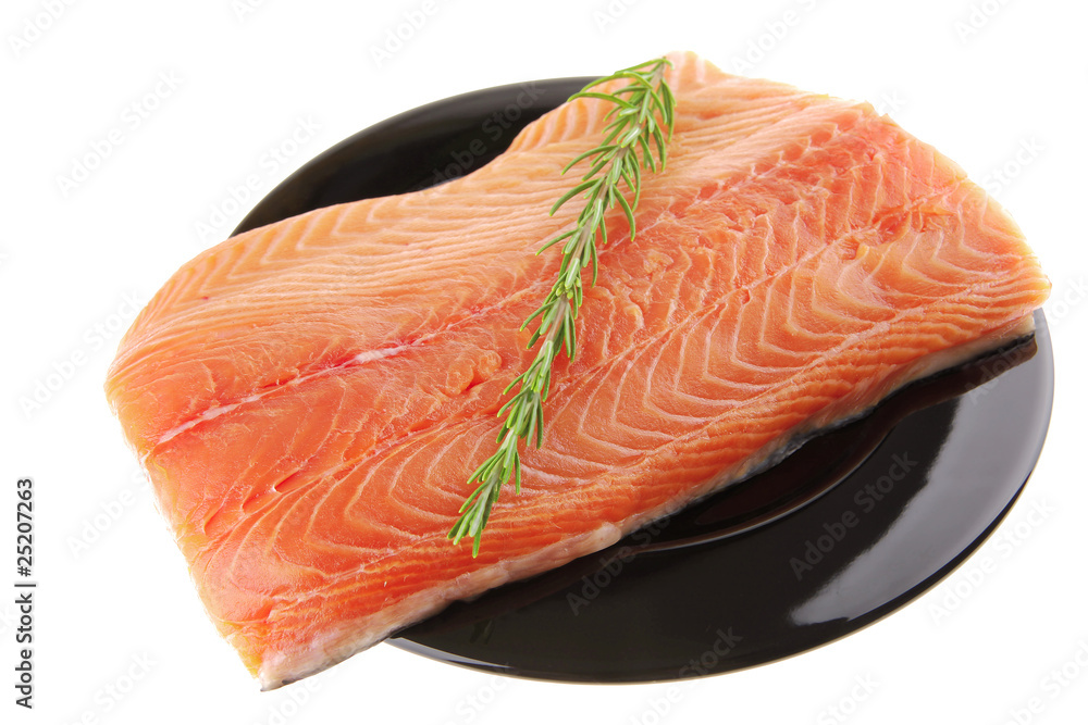 fresh raw salmon fillet on black with rosemary fresh raw salmon fillet on black with rosemary