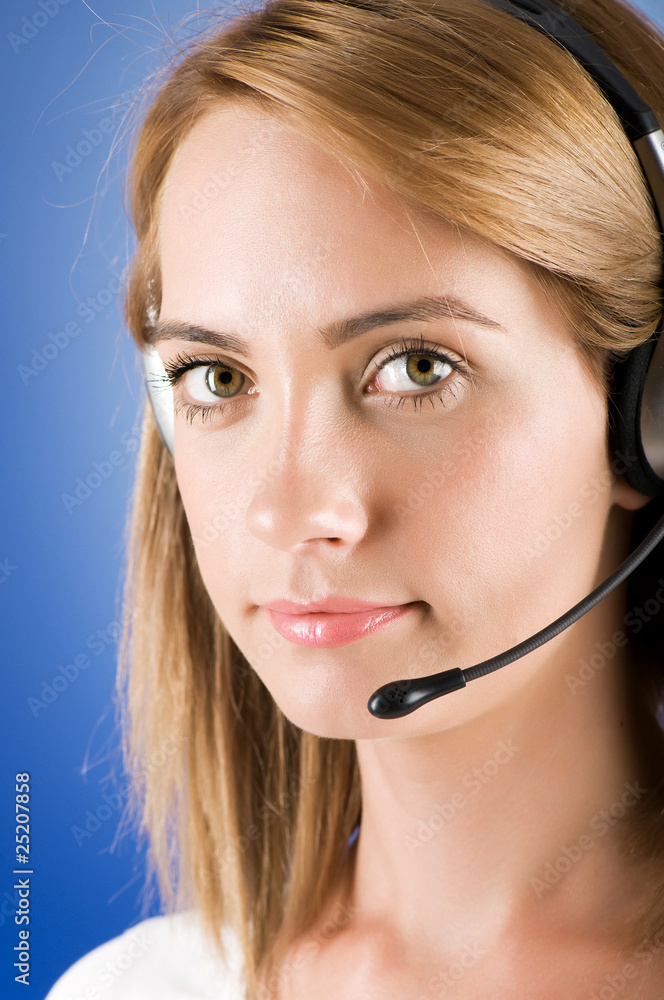 Young call center operator with the headset Young call center operator with the headset
