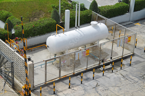 Fotografie Liquid Petroleum Gas (LPG) storage unit inside a security fence
