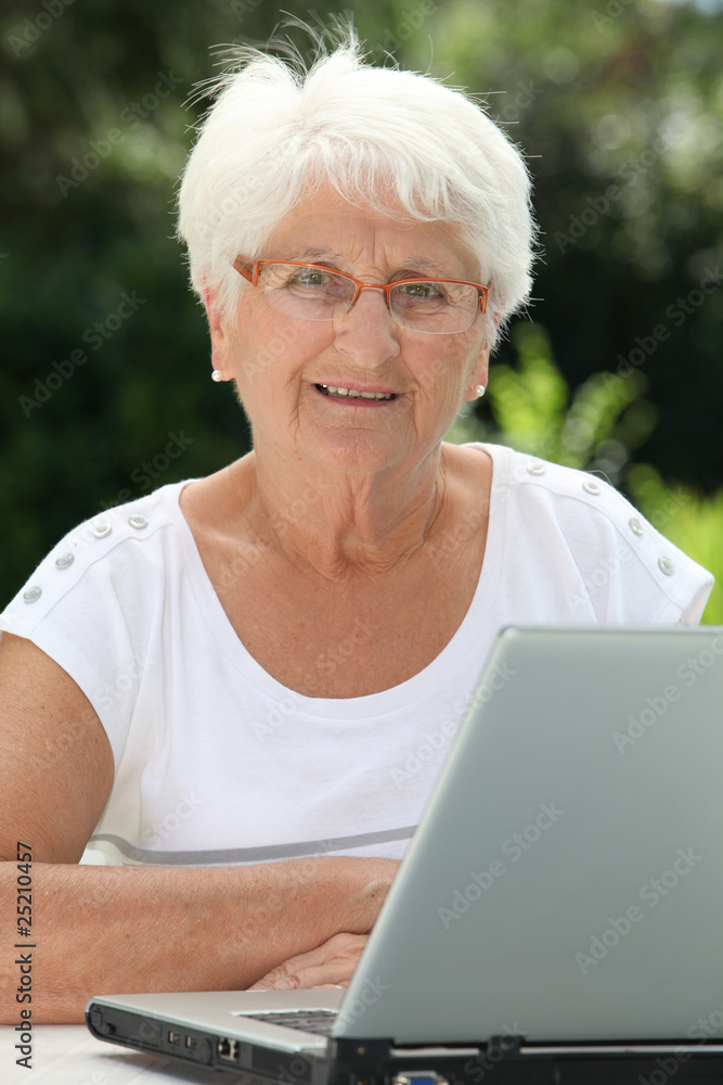 Elderly woman using internet Elderly woman using internet