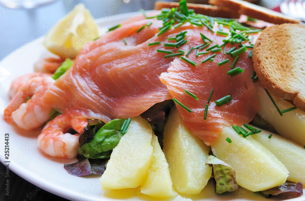 Fresh Salmon with lemon and bread Fresh Salmon with lemon and bread