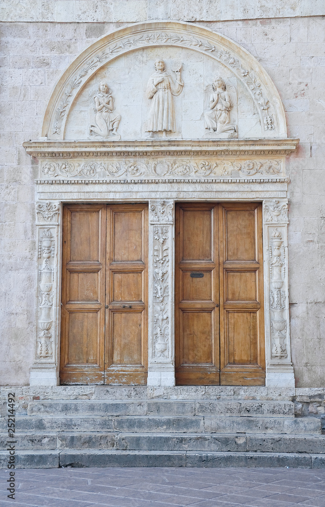 Wooden doors. St. Francesco Basilica. Assisi. Umbria.