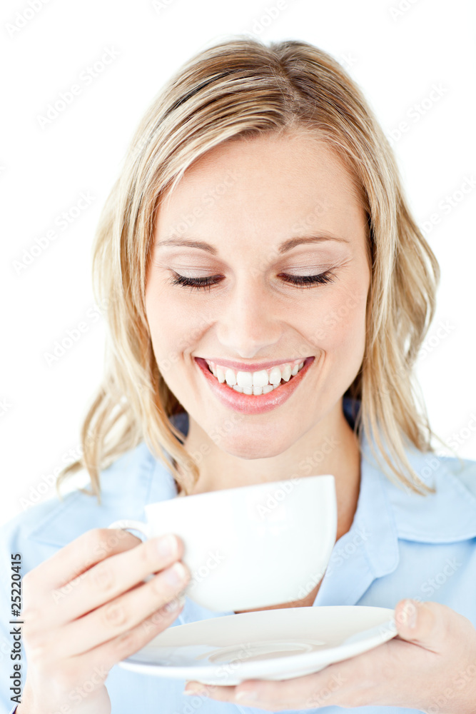 Glowing businesswoman holding a cup of coffee Glowing businesswoman holding a cup of coffee