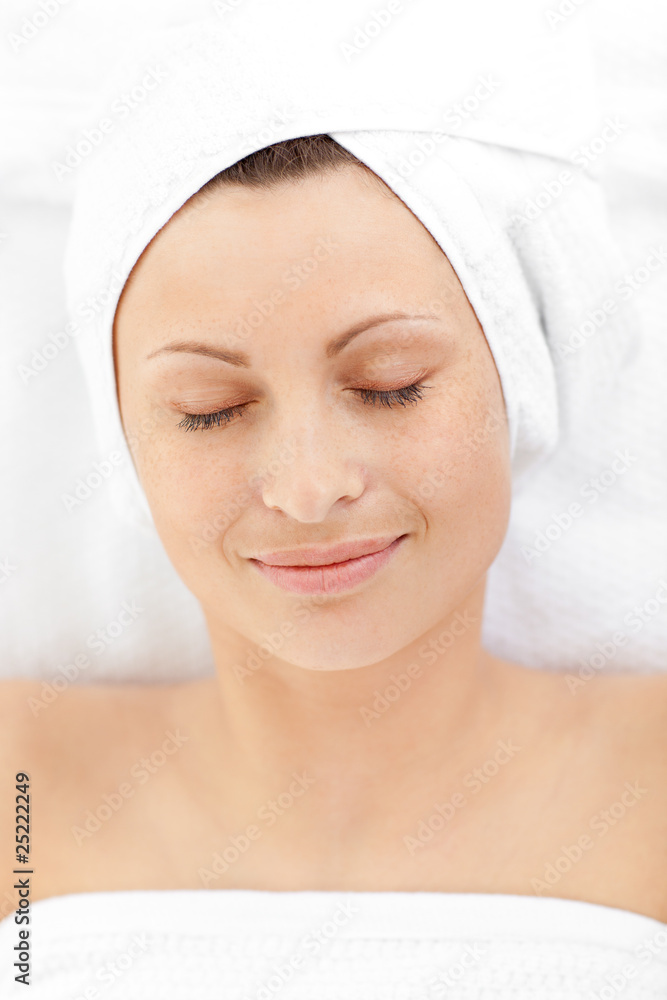 Portrait of a relaxed woman lying on a massage table Portrait of a relaxed woman lying on a massage table