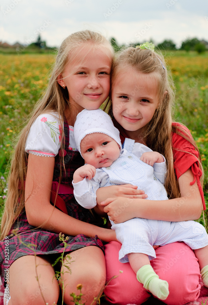 Fototapeta premium Two sisters and brother