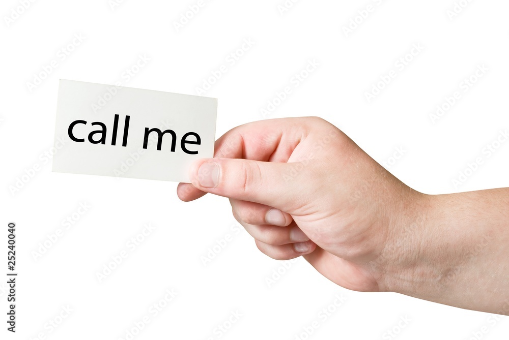 Call me. White paper card in human hand Call me. White paper card in human hand