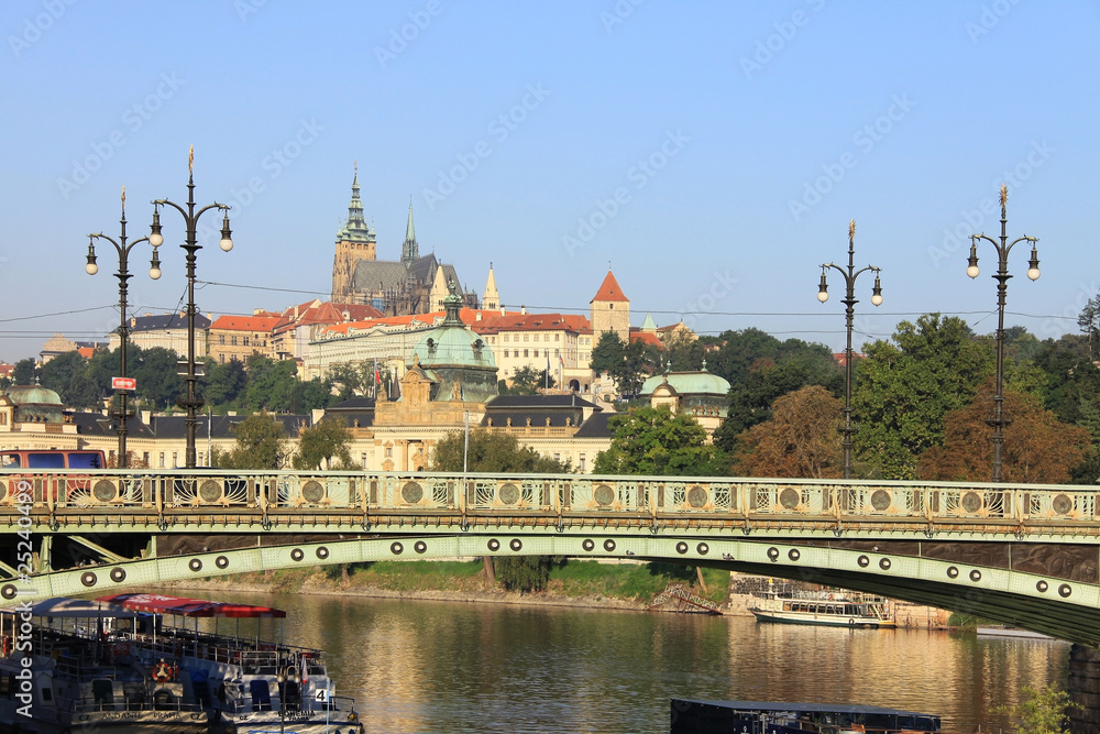 The View on summer Prague gothic Castle above River Vltava