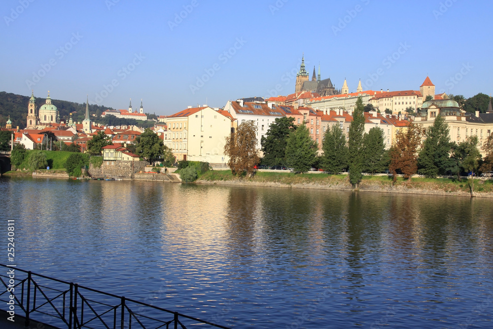 The View on summer Prague above River Vltava with  gothic Castle