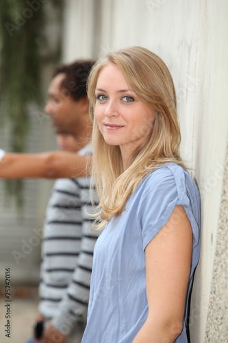 Closeup of happy student standing outside