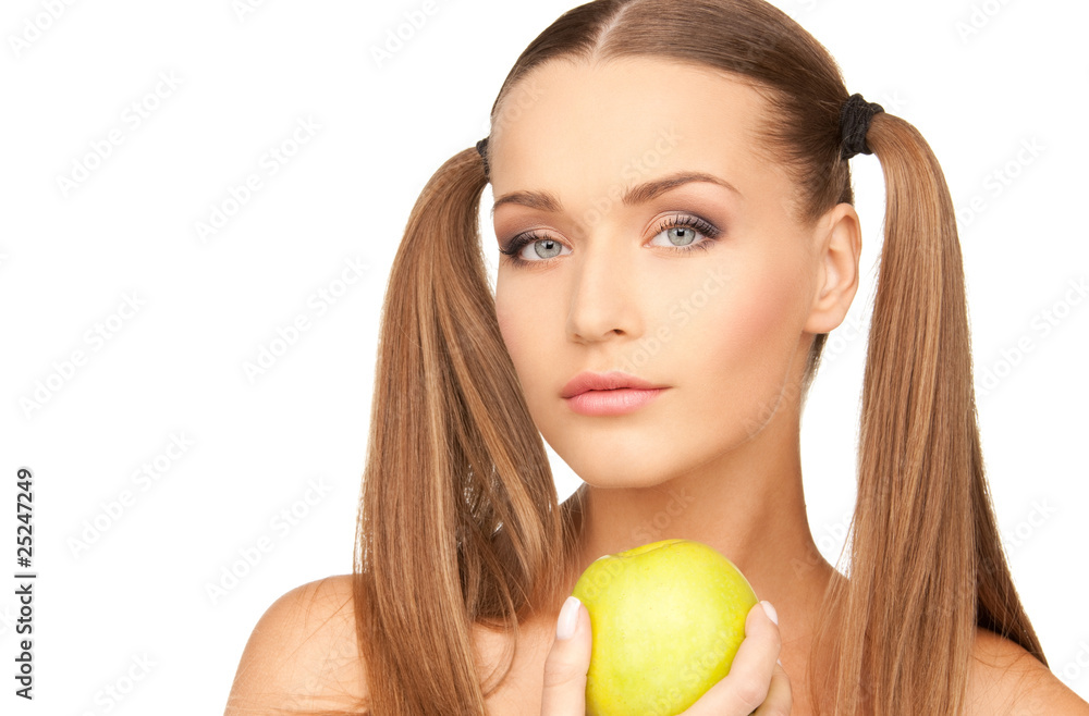 young beautiful woman with green apple young beautiful woman with green apple