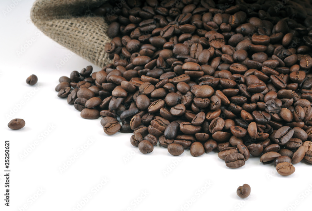 Fototapeta premium Coffee beans in burlap sack with empty space.