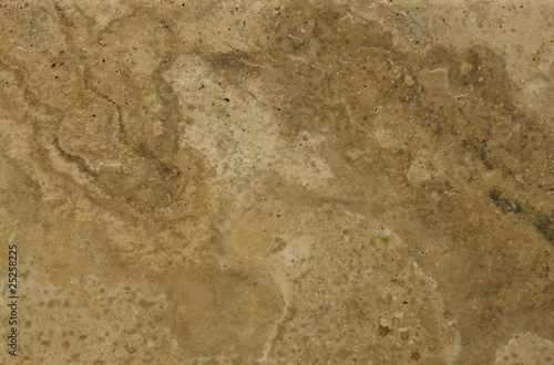 Surface of the travertine. Light brown colours.